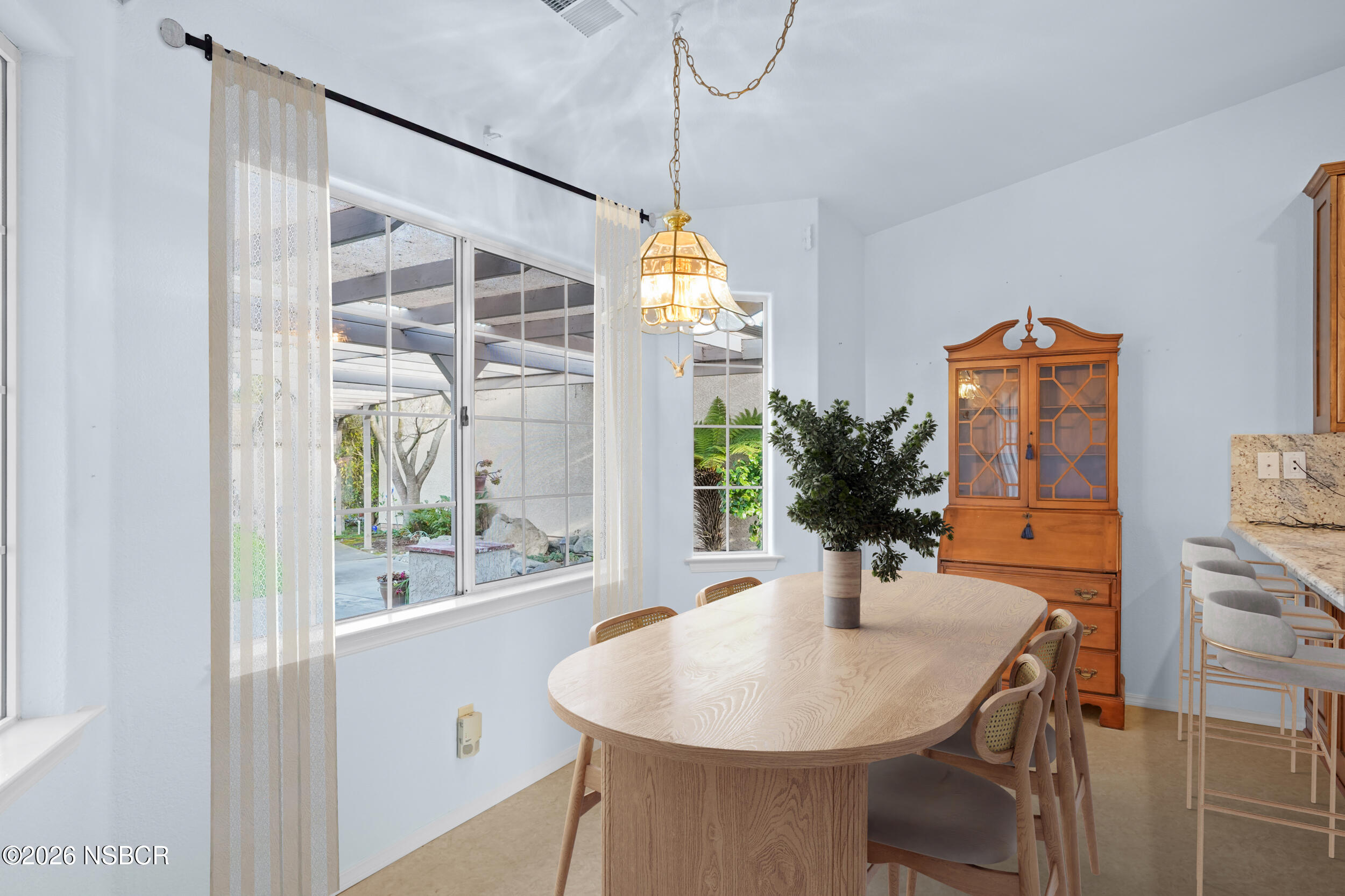 745 Inga Road Nipomo, CA 93444 - Photo 17 of 55 a dining room with furniture and window