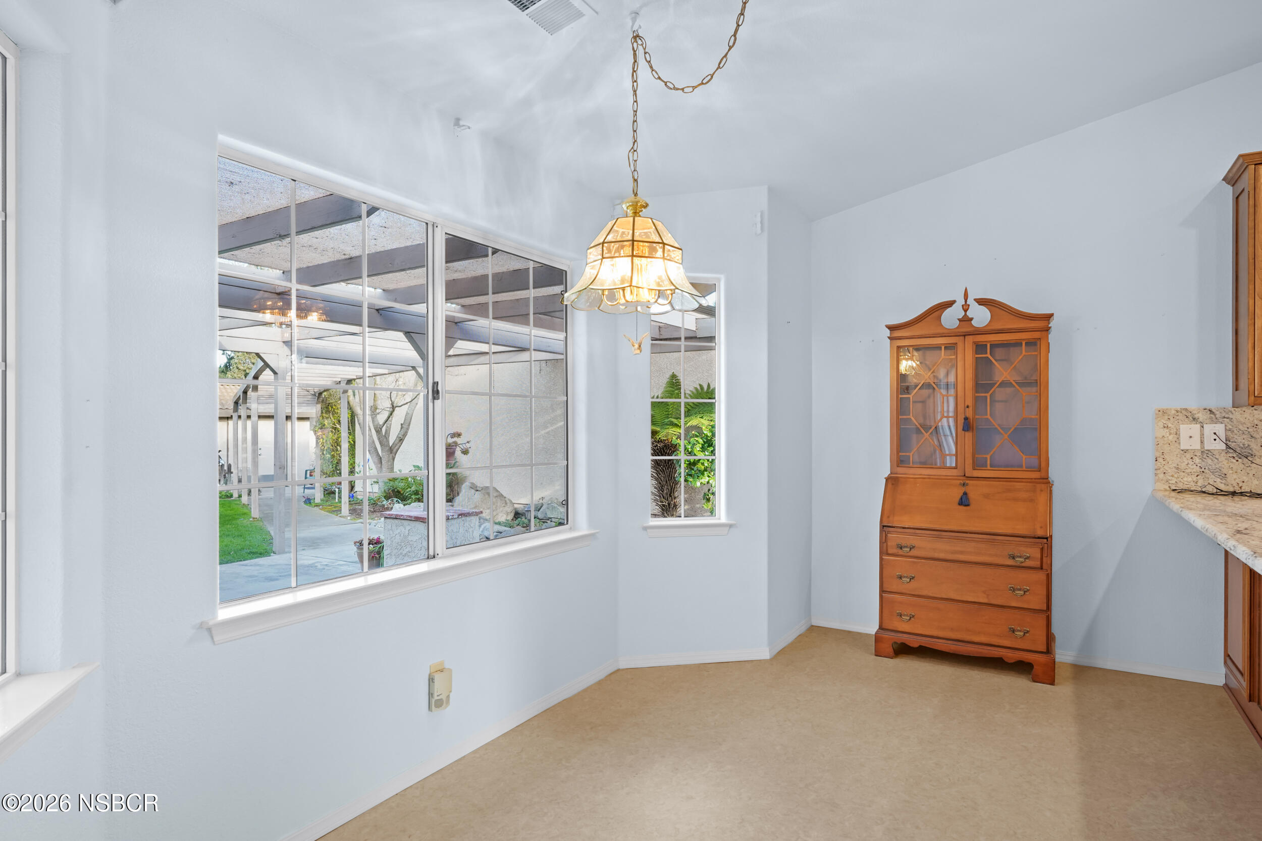 745 Inga Road Nipomo, CA 93444 - Photo 18 of 55 a room with window and a chandelier fan