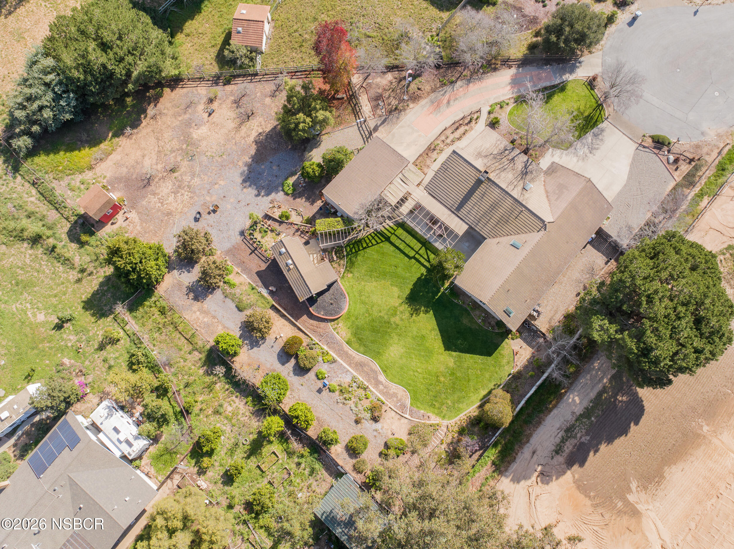 745 Inga Road Nipomo, CA 93444 - Photo 2 of 55 an aerial view of a house with a yard and swimming pool
