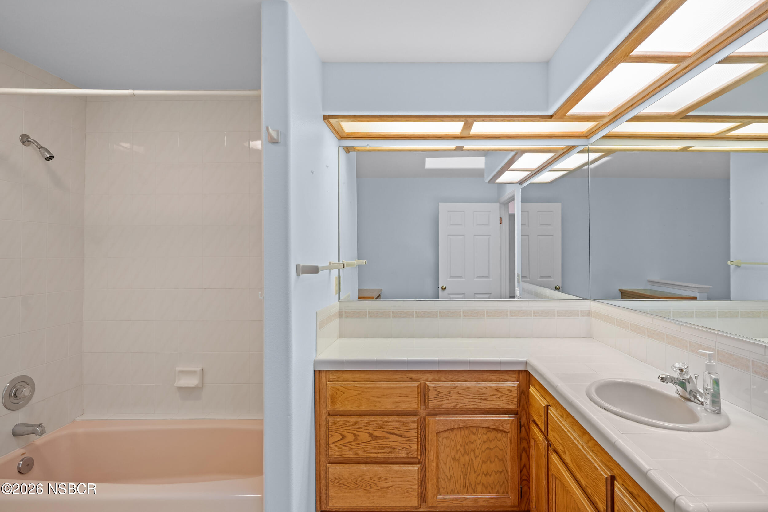 745 Inga Road Nipomo, CA 93444 - Photo 27 of 55 a bathroom with a sink and a bathtub