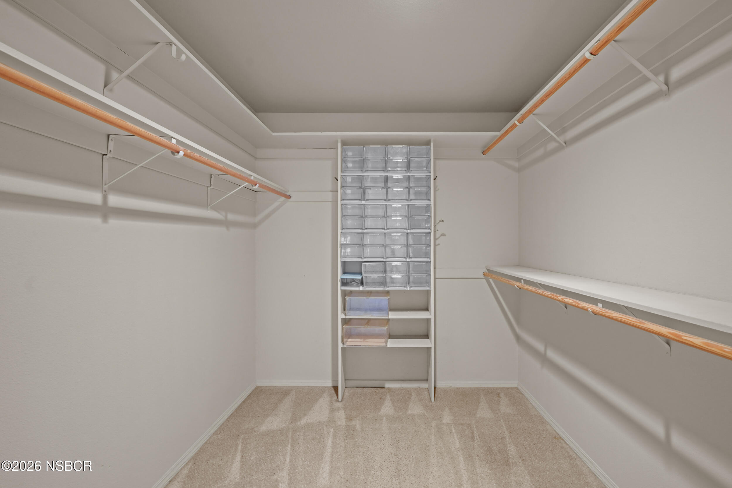 745 Inga Road Nipomo, CA 93444 - Photo 37 of 55 a view of walk in closet with empty racks