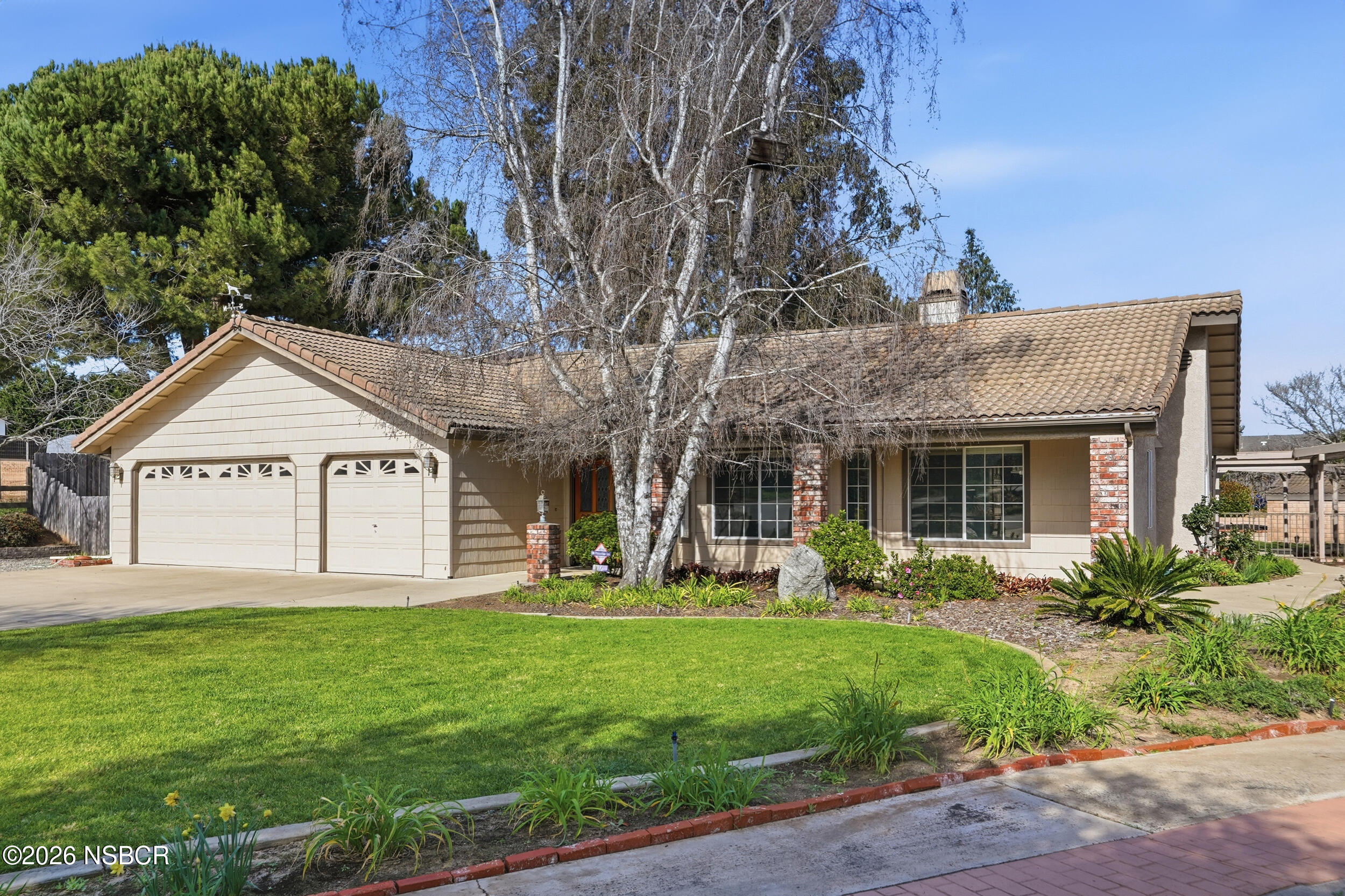 745 Inga Road Nipomo, CA 93444 - Photo 5 of 55 a front view of a house with garden