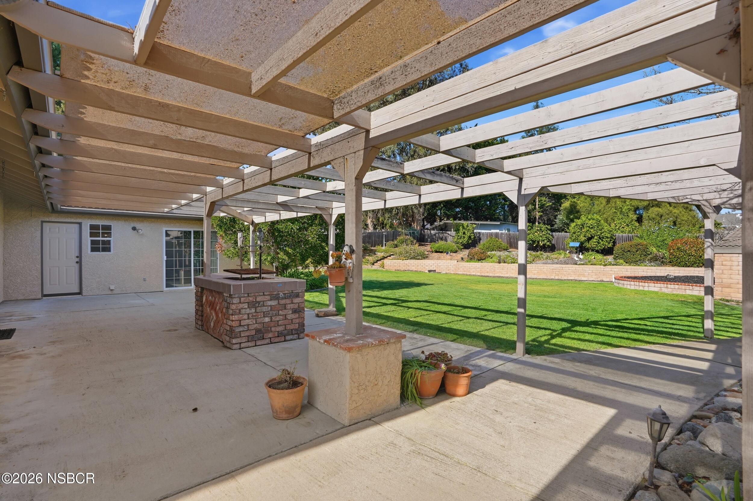 745 Inga Road Nipomo, CA 93444 - Photo 52 of 55 a view of a porch with a yard