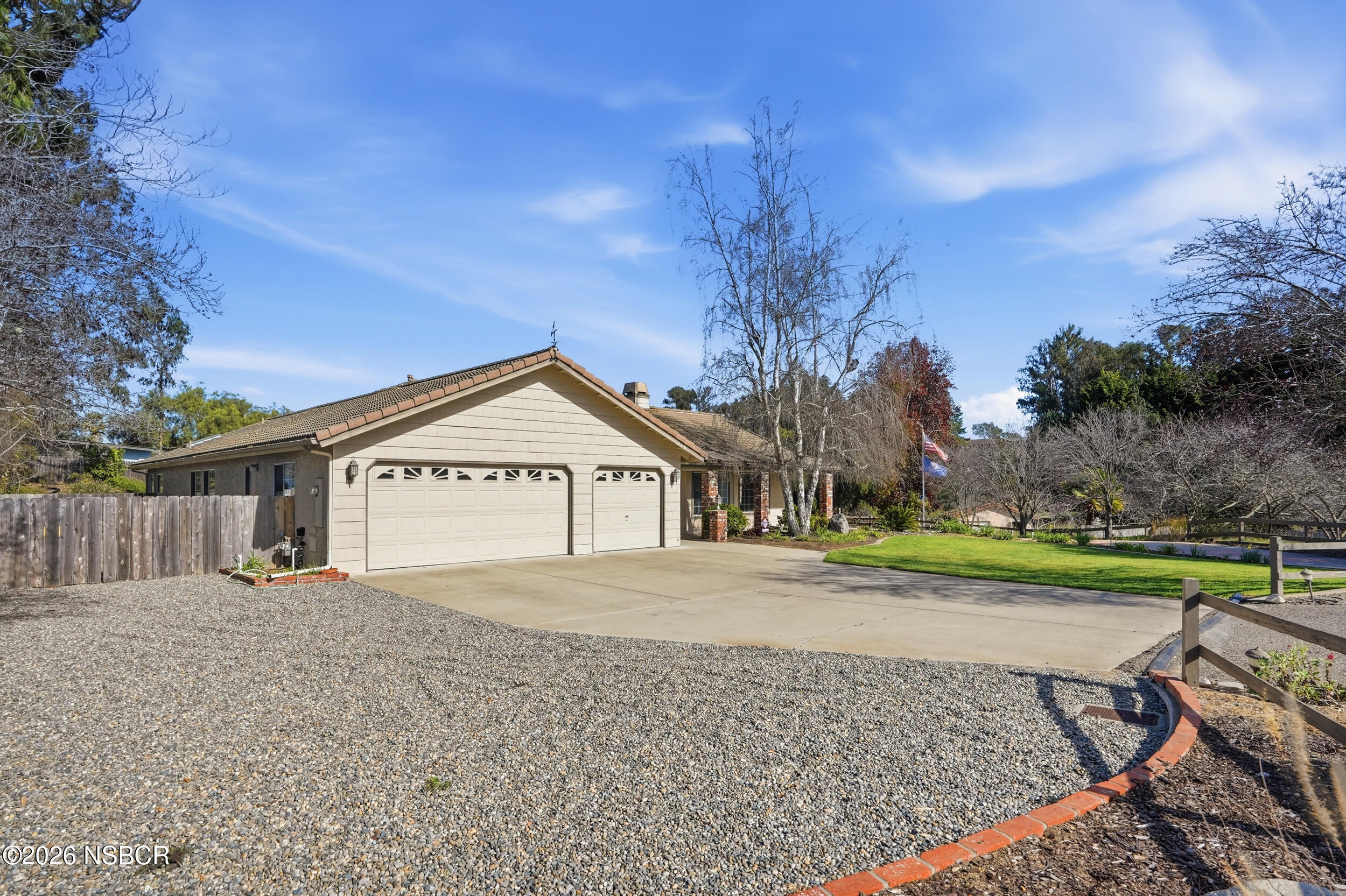745 Inga Road Nipomo, CA 93444 - Photo 6 of 55 a view of a house with a yard and a large tree