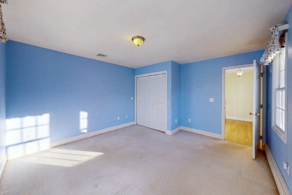 7 Delaney Drive Walpole, MA 02081 - Photo 20 of 35 a view of an empty room