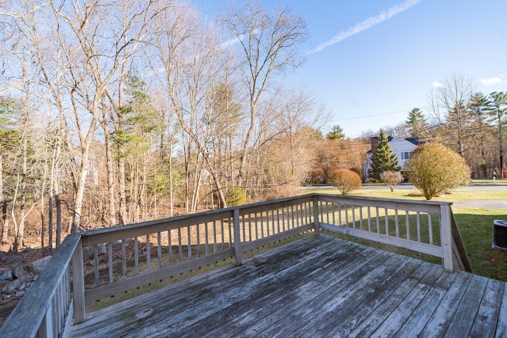 7 Delaney Drive Walpole, MA 02081 - Photo 30 of 35 a view of balcony with wooden floor