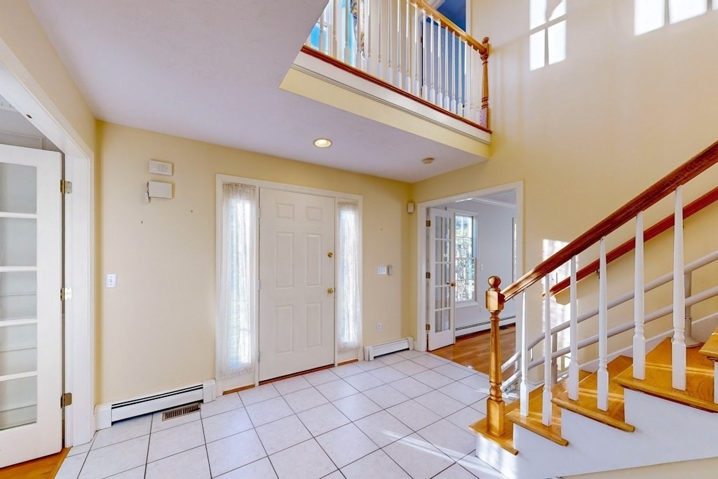7 Delaney Drive Walpole, MA 02081 - Photo 3 of 35 a view of an entryway with a workspace