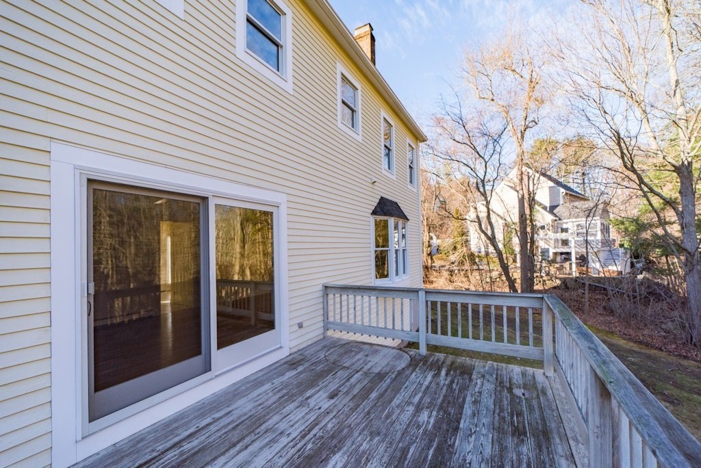 7 Delaney Drive Walpole, MA 02081 - Photo 31 of 35 a view of a house with a deck