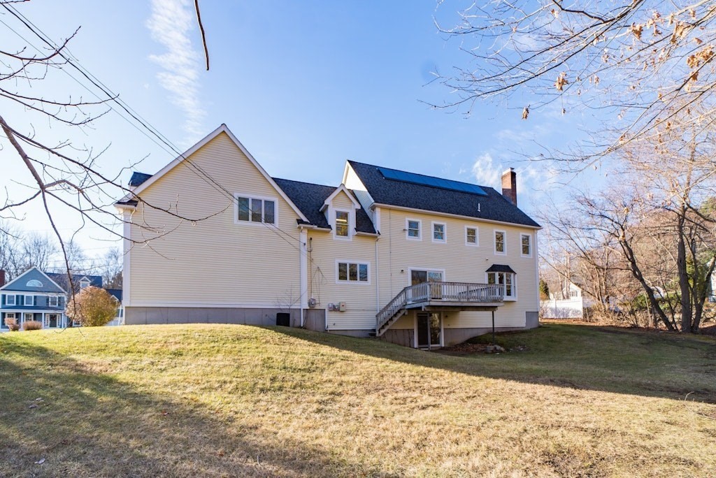 7 Delaney Drive Walpole, MA 02081 - Photo 34 of 35 a front view of a house with a yard