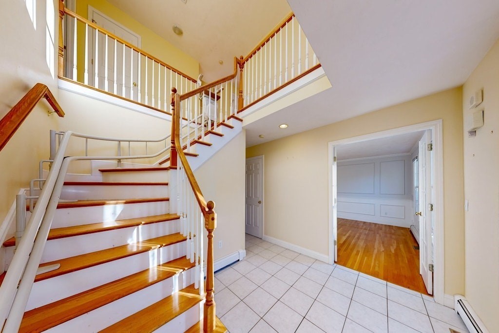 7 Delaney Drive Walpole, MA 02081 - Photo 4 of 35 a view of entryway with wooden floor