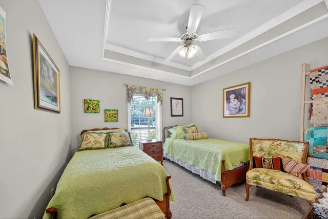 a bathroom with a sink vanity and a mirror