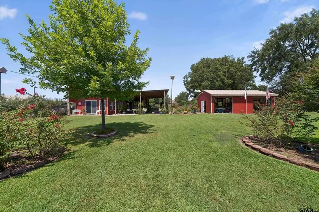 a view of a storage room with racks on the wall