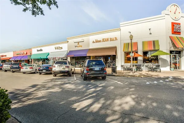 a car parked in front of a building