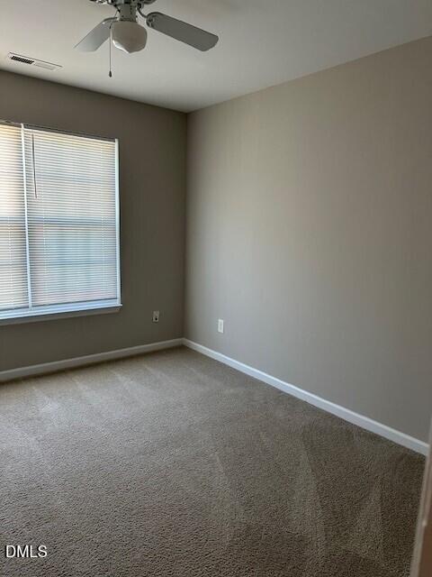 15 Red Lane Raleigh, NC 27606 - Photo 14 of 16 an empty room with a window