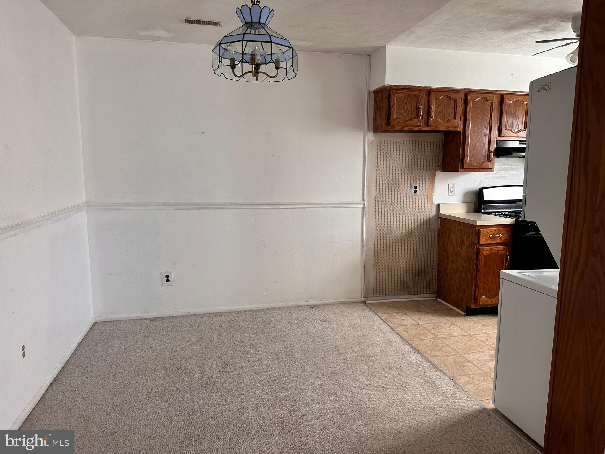 1155 York Rd., Unit C11 Warminster, PA 18974 - Photo 5 of 21 a kitchen with a refrigerator and a stove