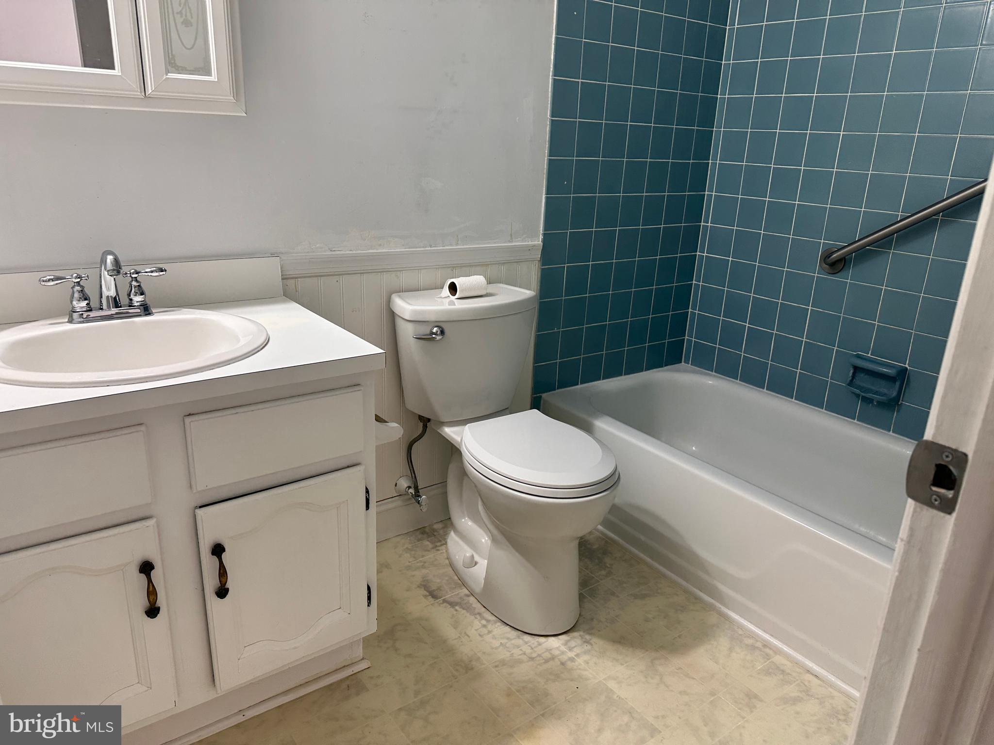 1155 York Rd., Unit C11 Warminster, PA 18974 - Photo 8 of 21 a white toilet sitting next to a bathroom sink