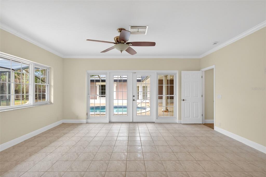 7108 Midnight Pass Road Sarasota, FL 34242 - Photo 20 of 83 a view of an empty room with a window