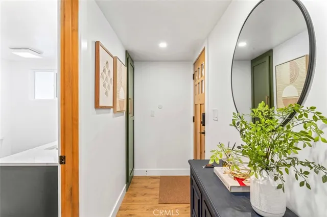 a room with furniture pool table and a fireplace