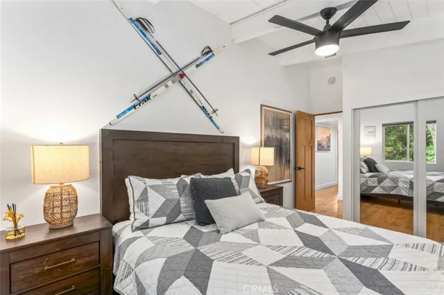a living room with furniture pool table and a window