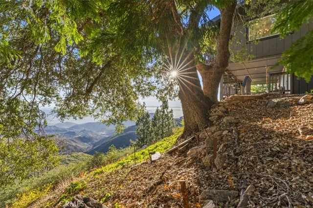 a view of a balcony with chairs