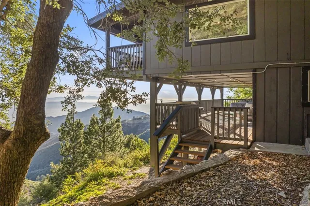 a view of balcony with wooden floor