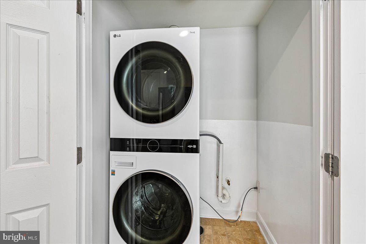 603 Queenstown Road Severn, MD 21144 - Photo 56 of 85 Modern laundry setup in sleek space.