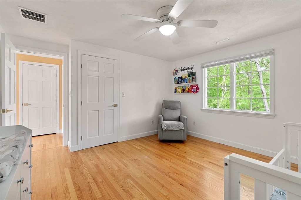 4 Blacksmith Way Saugus, MA 01906 - Photo 18 of 42 a view of livingroom with hardwood floor and ceiling fan