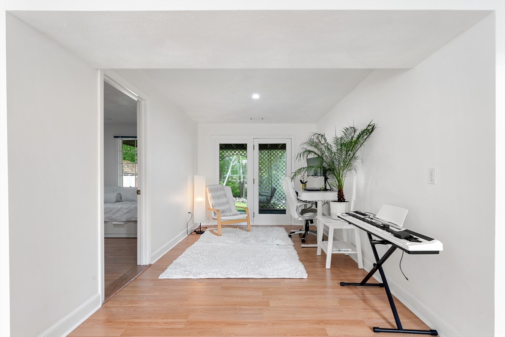 4 Blacksmith Way Saugus, MA 01906 - Photo 25 of 42 a living room with furniture and a potted plant