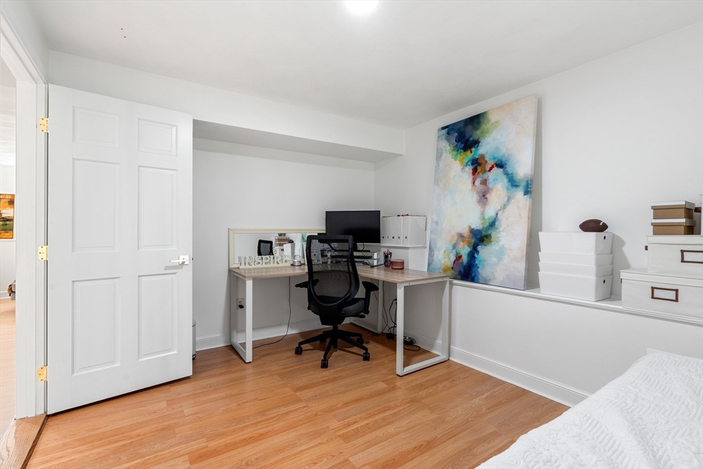 4 Blacksmith Way Saugus, MA 01906 - Photo 26 of 42 a view of a workspace with furniture and wooden floor