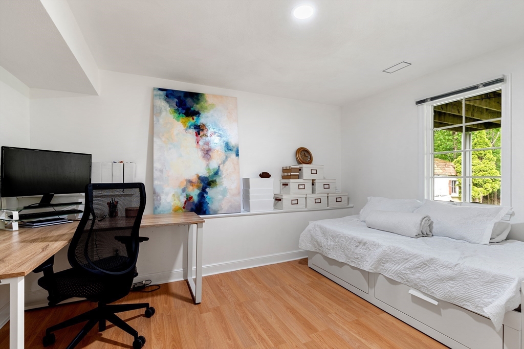 4 Blacksmith Way Saugus, MA 01906 - Photo 27 of 42 a bedroom with furniture and a flat screen tv
