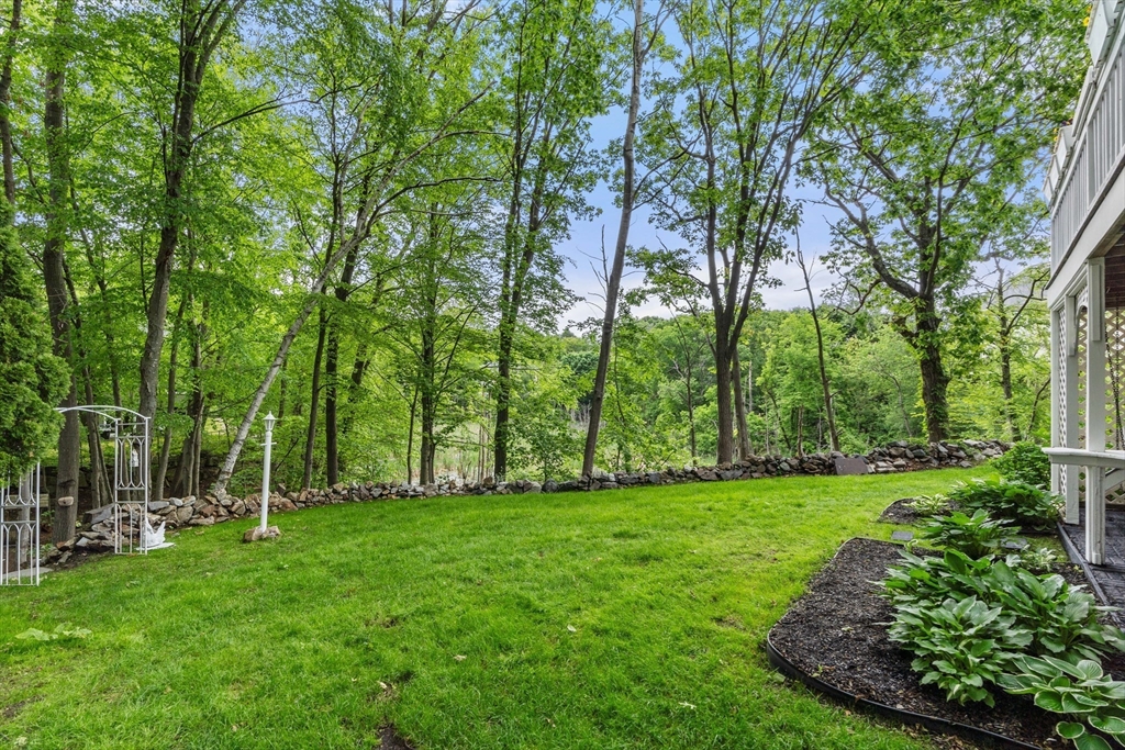 4 Blacksmith Way Saugus, MA 01906 - Photo 31 of 42 a view of green field with trees in the background