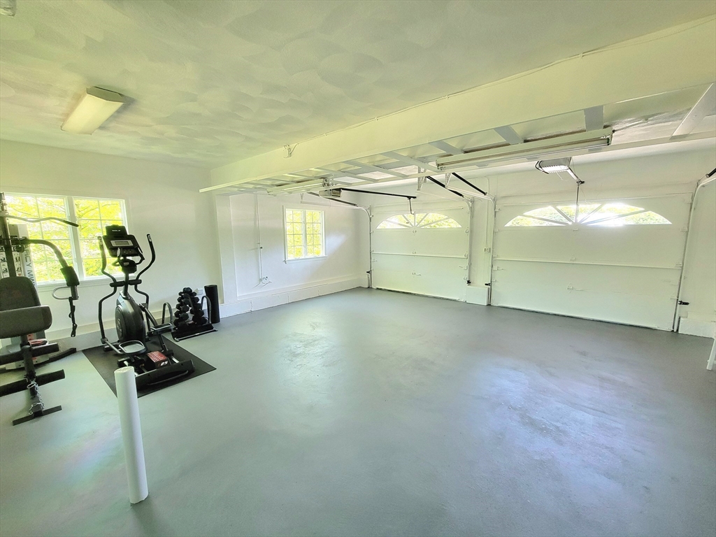 4 Blacksmith Way Saugus, MA 01906 - Photo 35 of 42 a view of a room with gym equipment