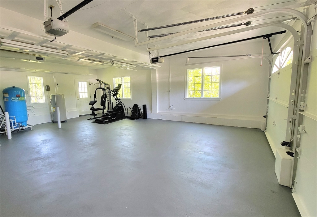 4 Blacksmith Way Saugus, MA 01906 - Photo 36 of 42 a view of a room with gym equipment