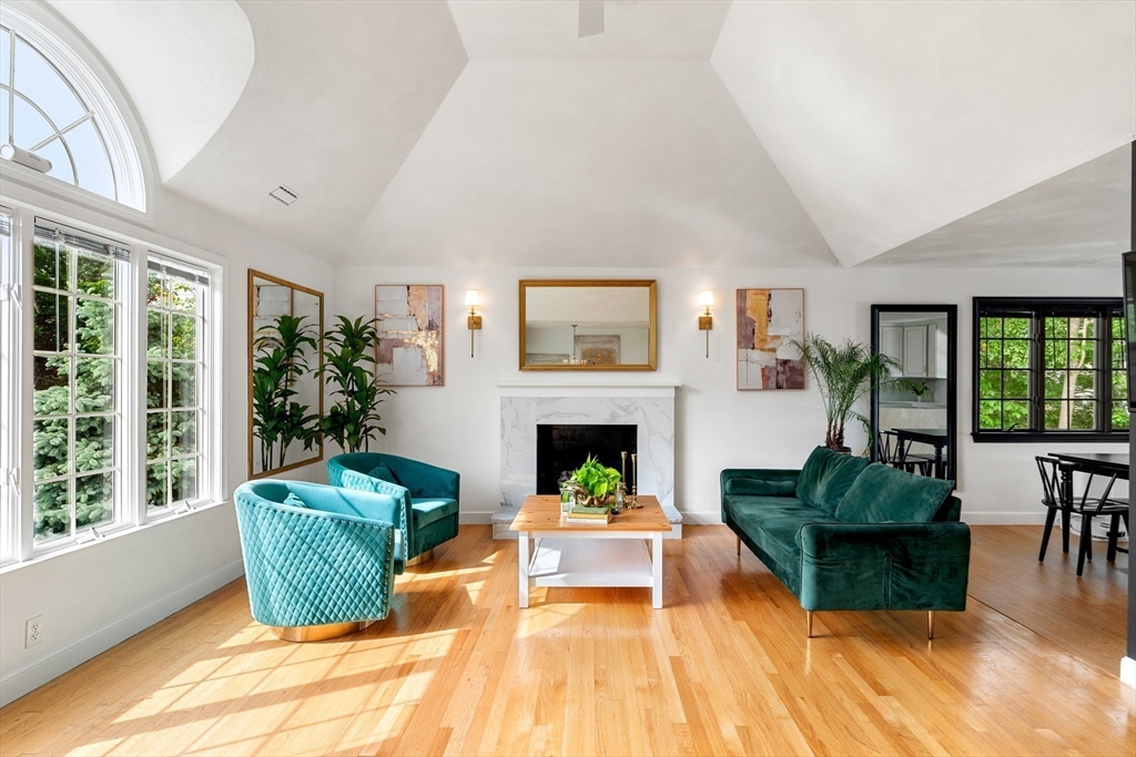 4 Blacksmith Way Saugus, MA 01906 - Photo 6 of 42 a living room with furniture and a fireplace