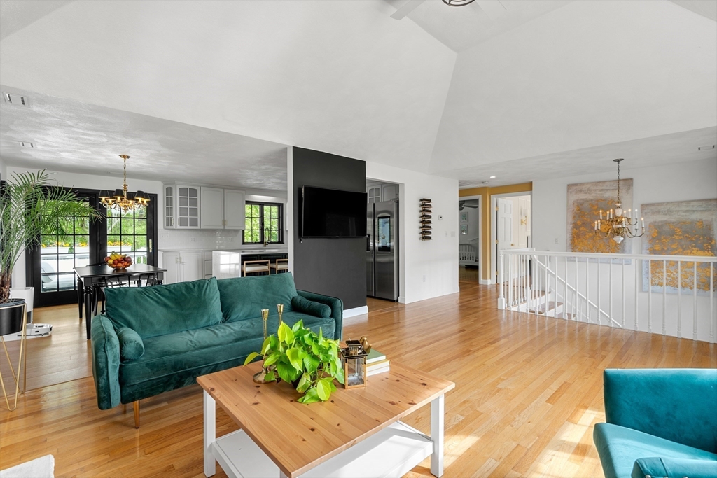 4 Blacksmith Way Saugus, MA 01906 - Photo 8 of 42 a living room with furniture and a flat screen tv
