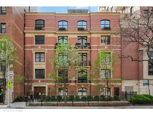 a front view of a multi story residential apartment building