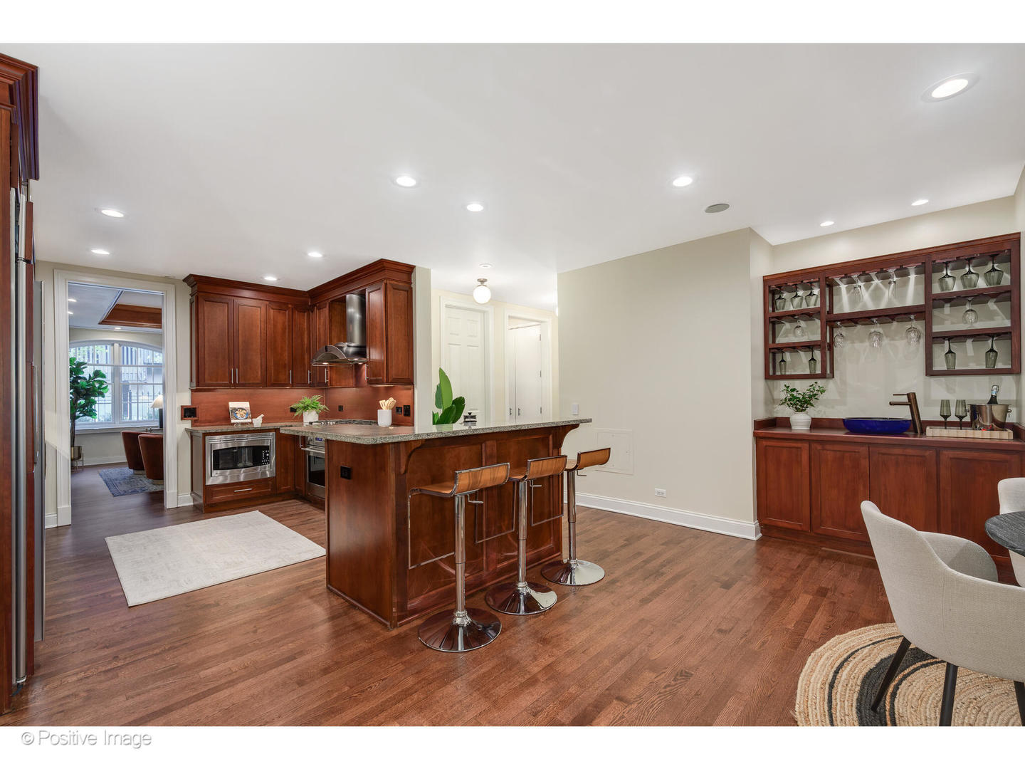1112 North Dearborn Street, Unit 1 Chicago, IL 60610 - Photo 11 of 34 a living room with furniture and kitchen view