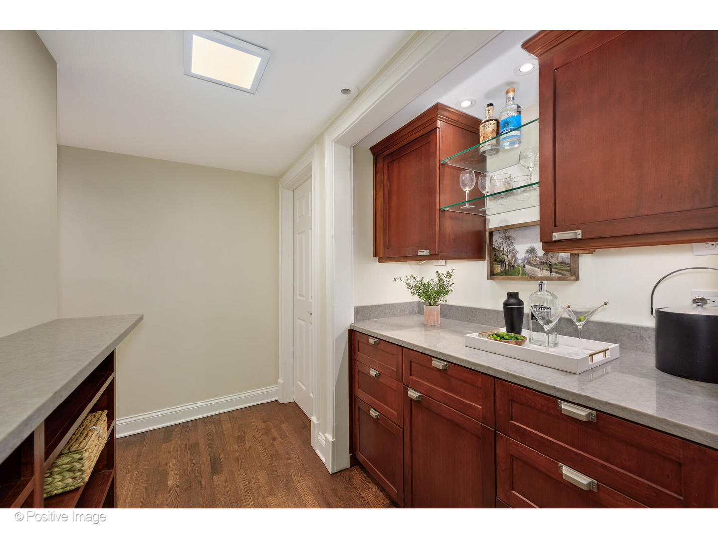 1112 North Dearborn Street, Unit 1 Chicago, IL 60610 - Photo 13 of 34 a bathroom with a sink vanity granite and a mirror