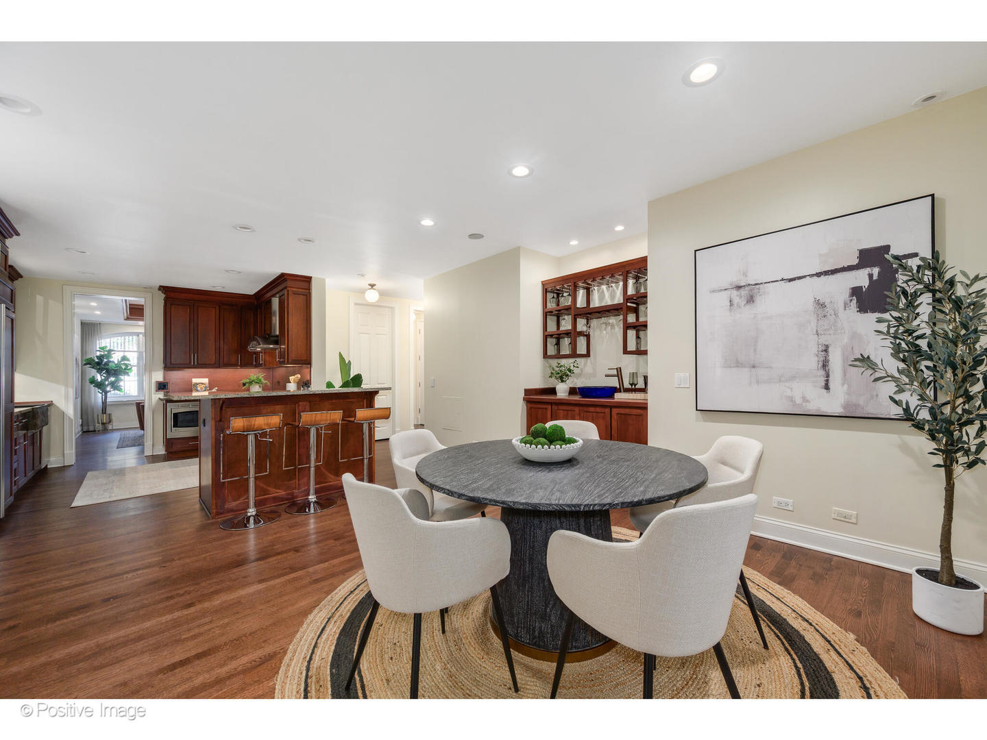 1112 North Dearborn Street, Unit 1 Chicago, IL 60610 - Photo 14 of 34 a view of a dining room with furniture and wooden floor