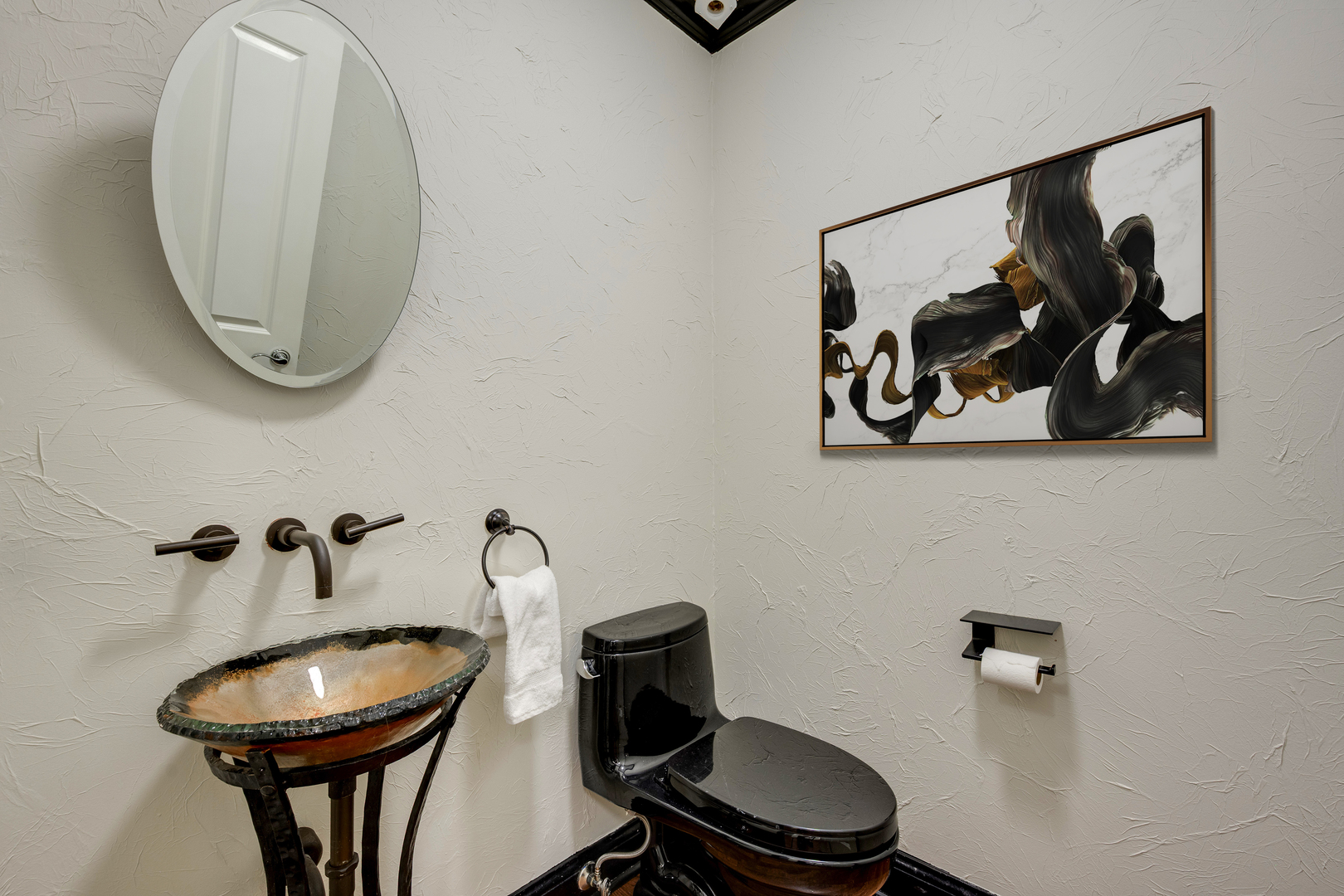 1112 North Dearborn Street, Unit 1 Chicago, IL 60610 - Photo 28 of 34 a bathroom with a toilet and a mirror