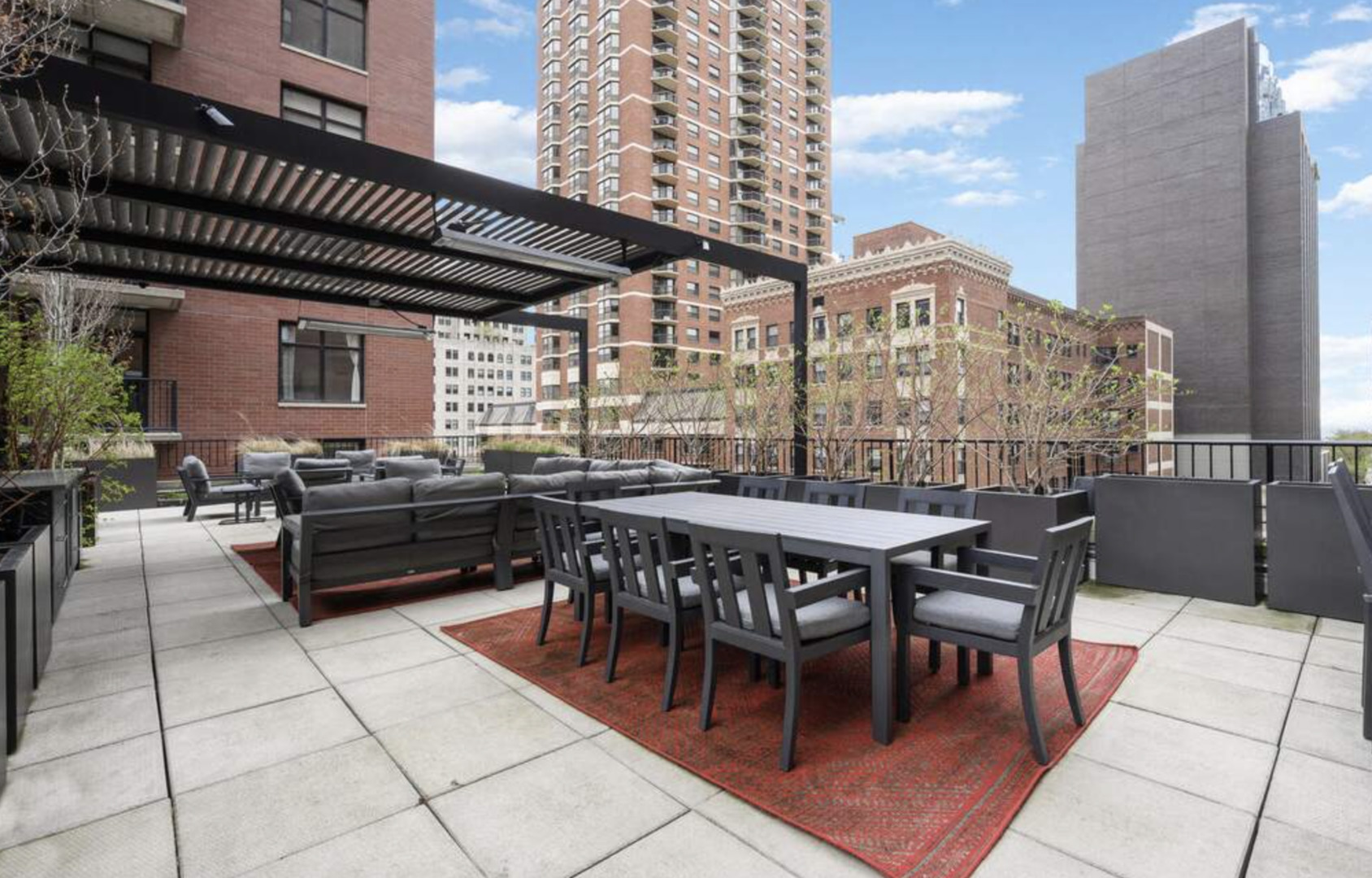 1112 North Dearborn Street, Unit 1 Chicago, IL 60610 - Photo 33 of 34 a view of a dinning tables and chairs in the patio