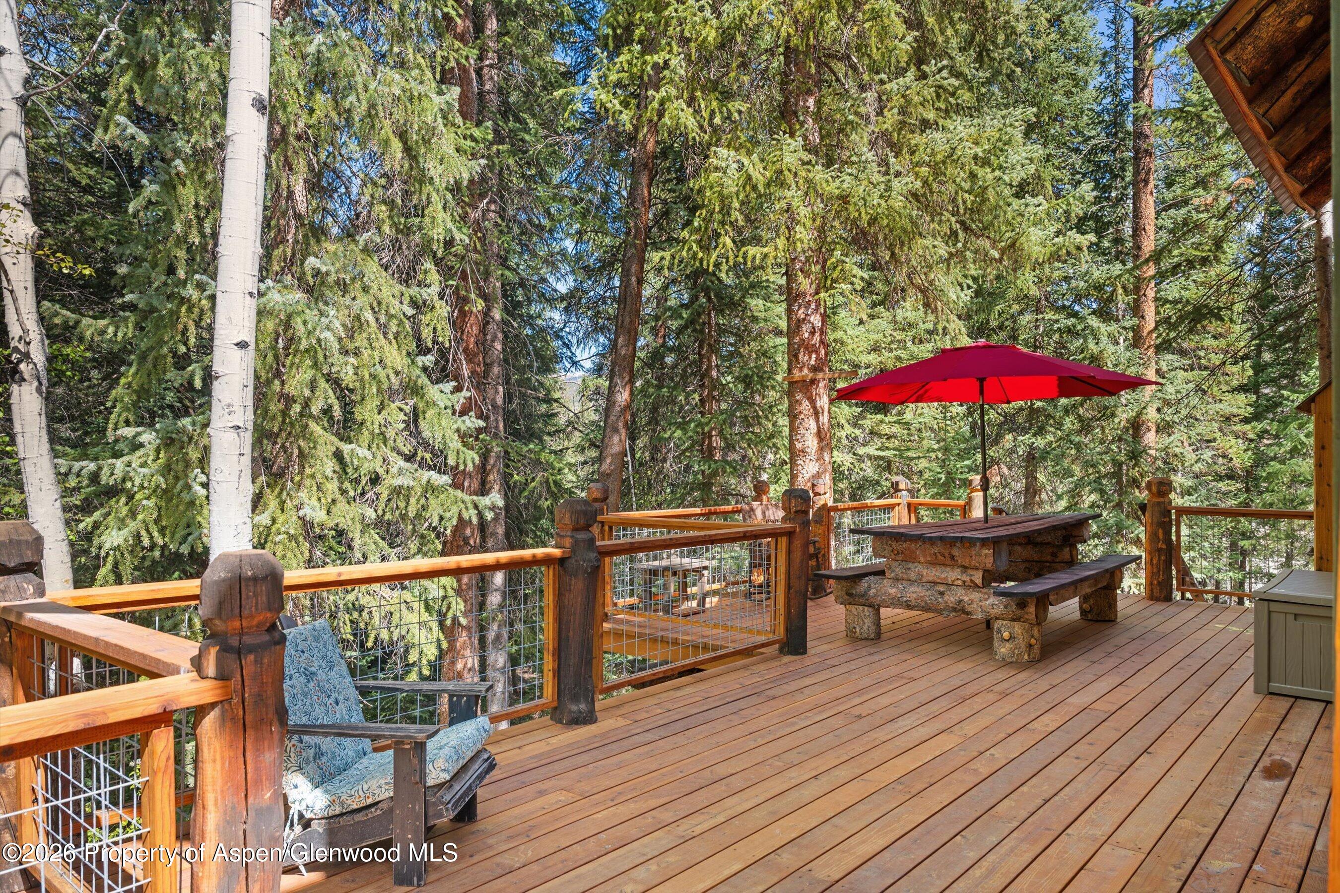 26608 Frying Pan Road Meredith, CO 81642 - Photo 13 of 49 a view of a balcony with furniture