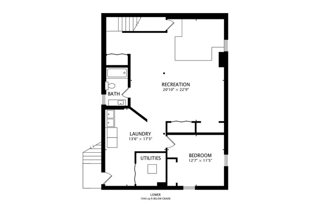 a picture of a bench in front of a wall