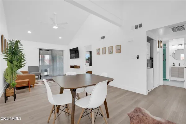 a living room with furniture and a table