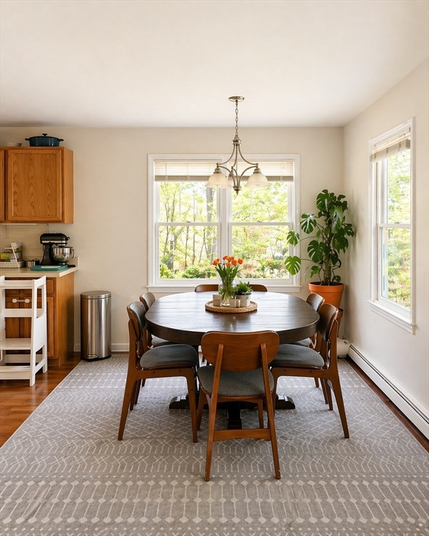 4 Westview Terrace, Unit 4 Natick, MA 01760 - Photo 2 of 9 a view of a dining room with furniture