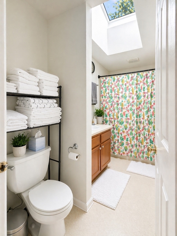 4 Westview Terrace, Unit 4 Natick, MA 01760 - Photo 8 of 9 a bathroom with a sink toilet and shower