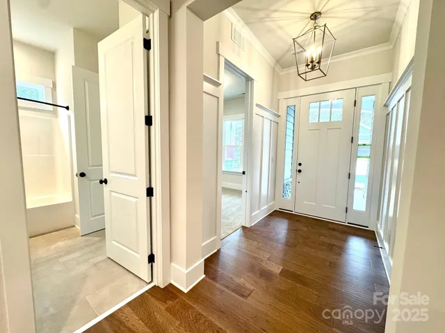 a view of entryway with wooden floor