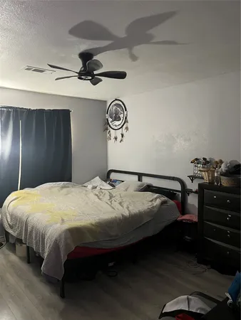 a room with furniture and musical instruments