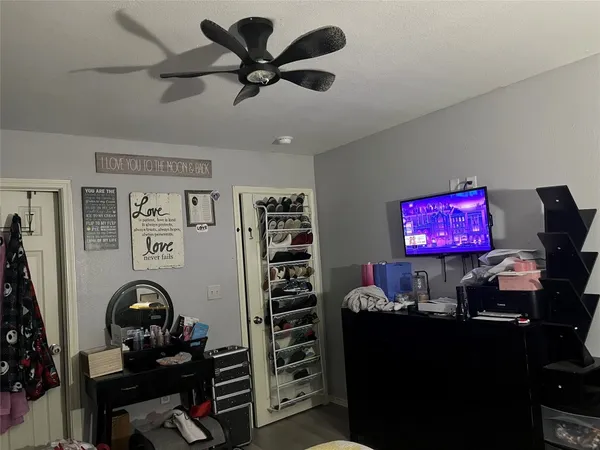 a room with furniture and musical instruments