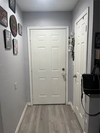 a view of a storage & utility room with a sink
